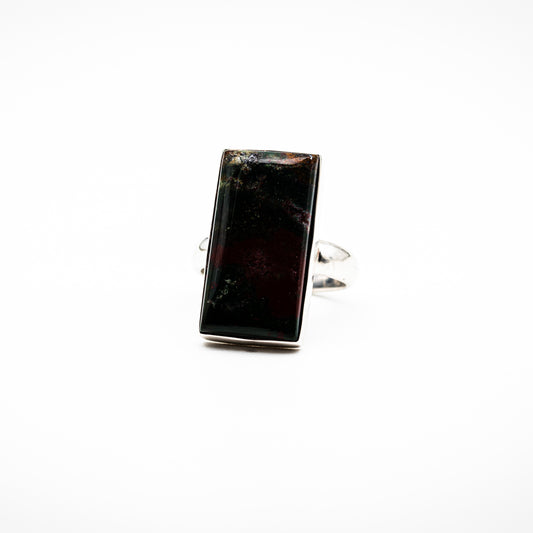 Bloodstone ring on a white surface