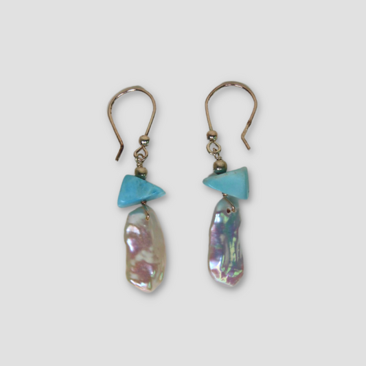 Light Blue and White Larimar & Pearl Earrings on a gray surface