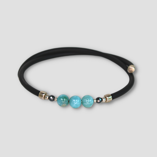 Larimar Leather Cord Bracelet on a gray surface