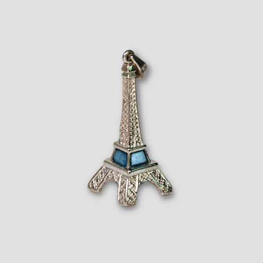 Light Blue Larimar Eiffel Pendant on a gray surface