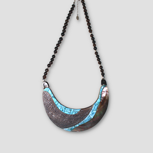 Larimar Nacre Black Lip Shell Necklace on a gray surface