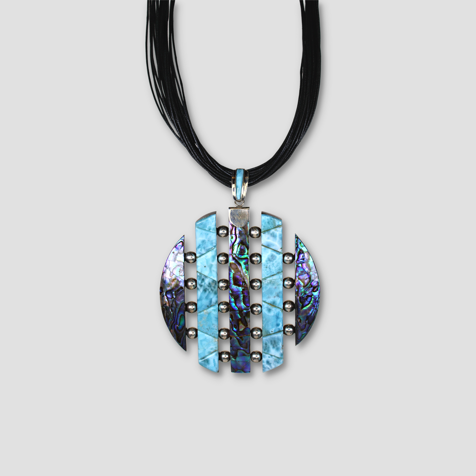 Blue Larimar Abalone Corded Necklace on a gray surface