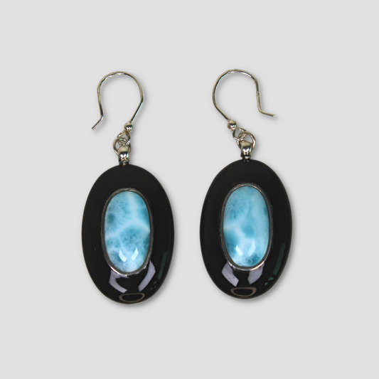Larimar Oval Earrings on a gray surface