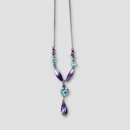 Light Blue and Purple Larimar & Amethyst Necklace on a gray surface