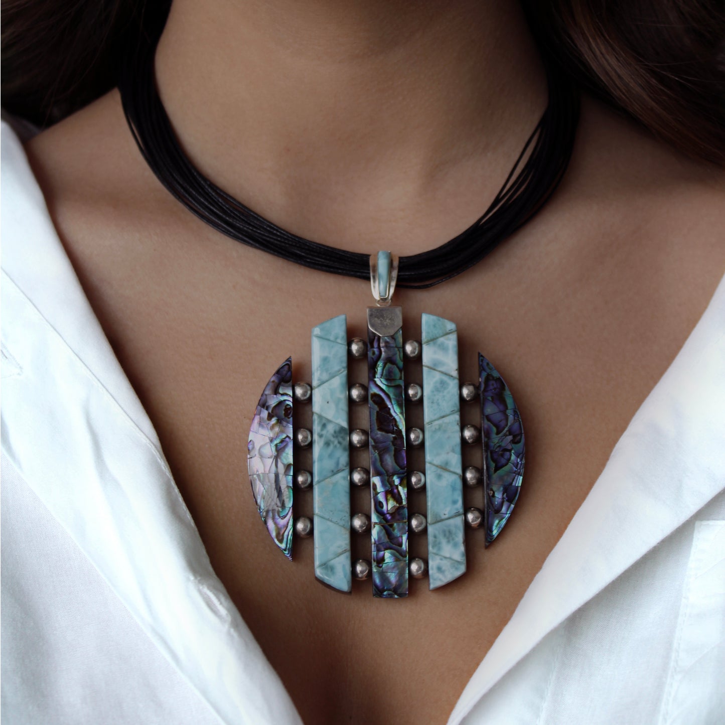A woman wearing Larimar Abalone Corded Necklace 