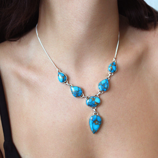 A woman wearing Blue Copper Turquoise Silver Necklace