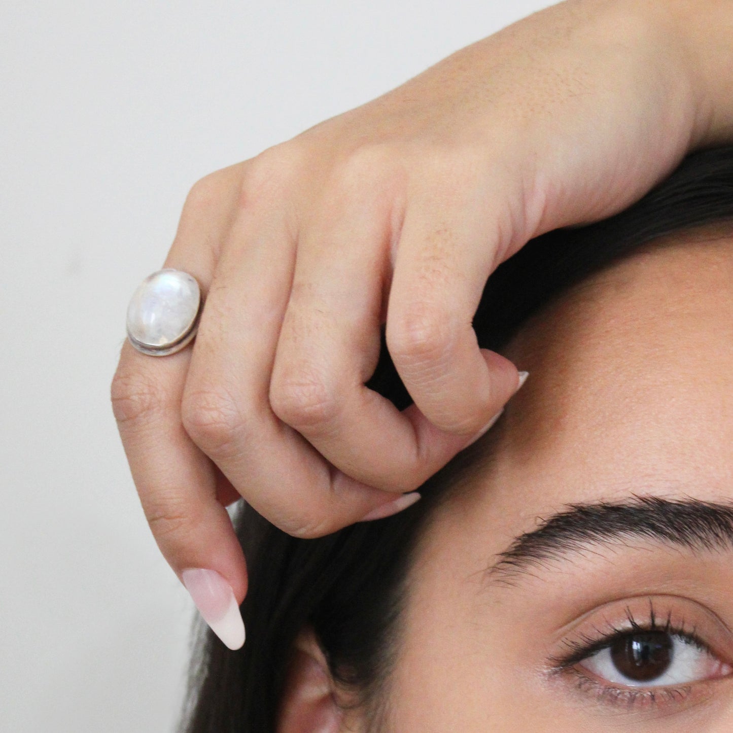 A woman wearing Moonstone Silver Ring