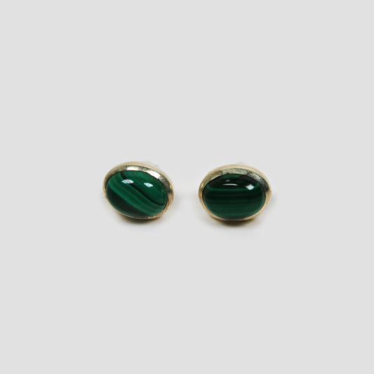 Green Malachite Silver Earrings on a gray surface