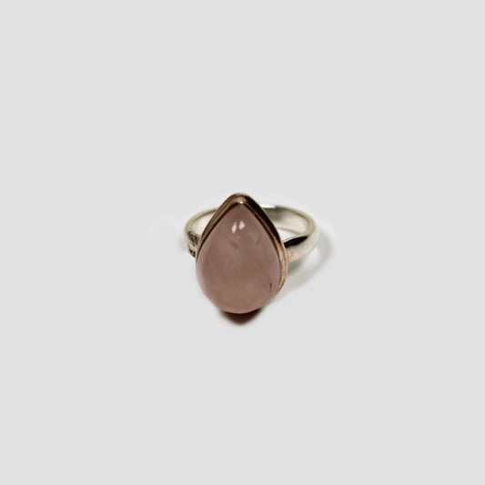 Rose quartz Silver Ring on a gray surface