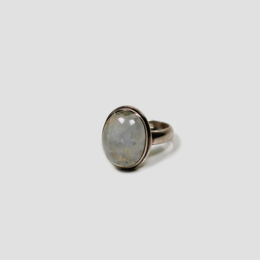 Moonstone Silver Ring on a gray surface