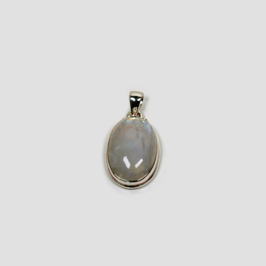 Moonstone Silver Pendant on a gray surface