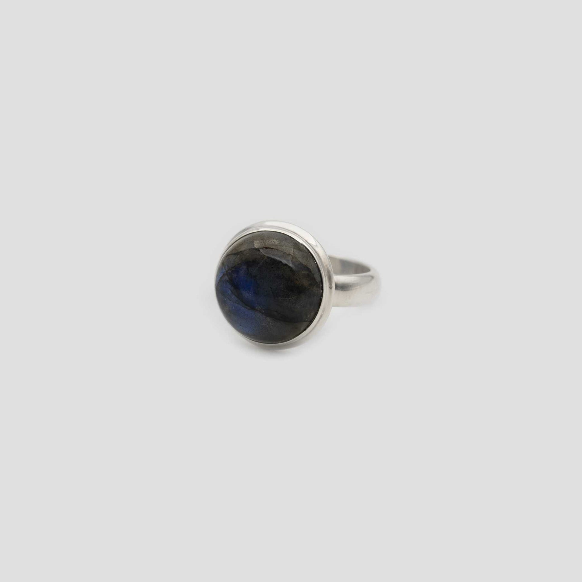 Gray Labradorite Silver Round Ring on a gray surface