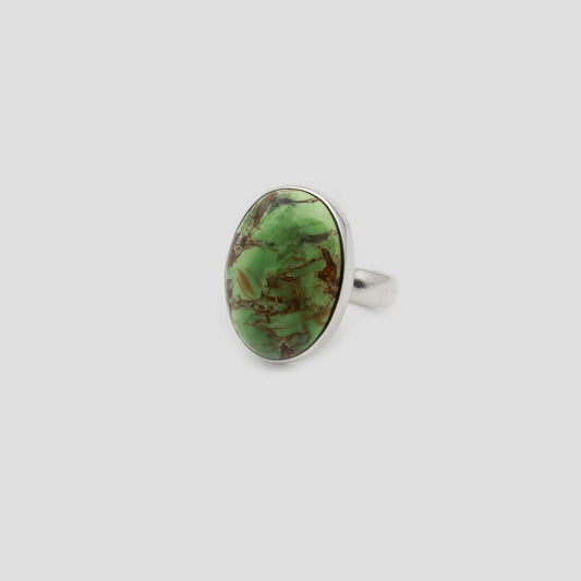 Green Variscite Silver Oval Ring on a gray surface